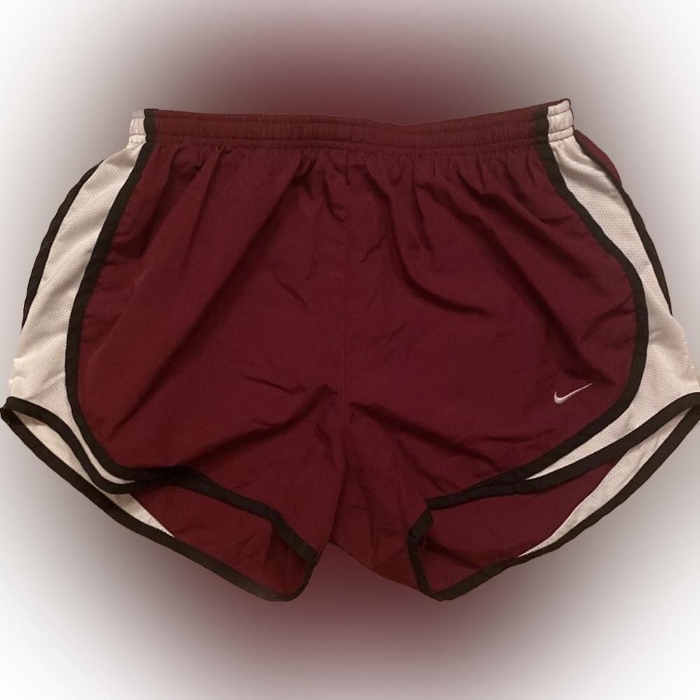 Women’s Nike Dri Fit shorts in maroon with white size medium